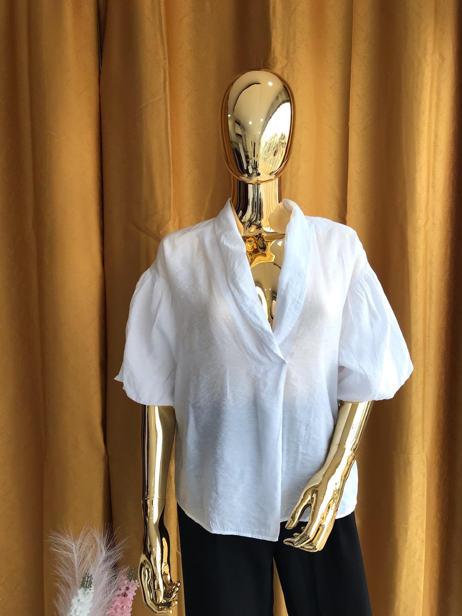 Blusa na loja Closet Mutolole